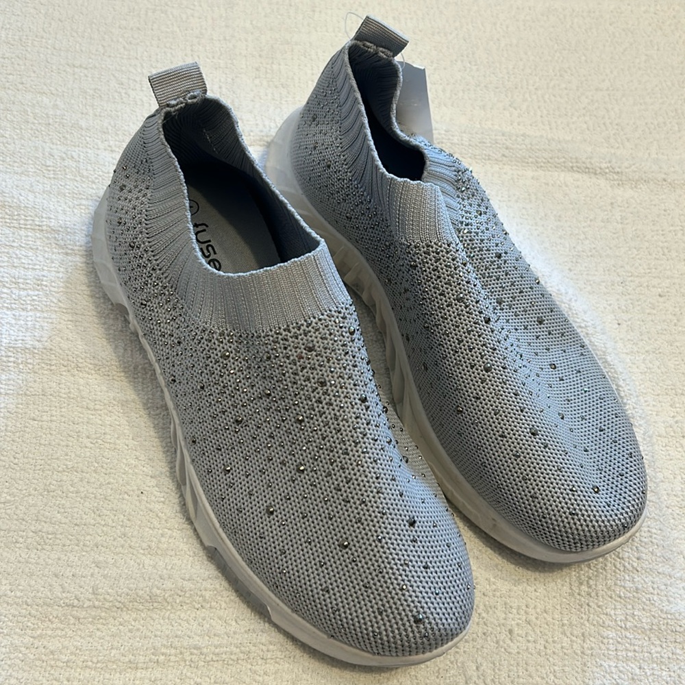 Grey bedazzled slip shoes
